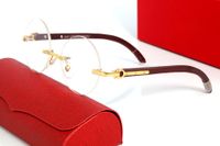Gafas de sol de moda de lujo Gafas de diseño sin montura Metal redondo Metal de madera Unisex con caja original Sin marco Oval 2021 ornamental