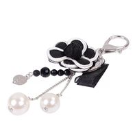 Nyckelringar kreativ pärla personlighet plommon nyckelring kvinnlig mode väska hänge tillbehör bilkedja charm present nyckelring