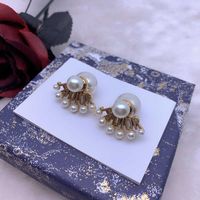 D Jia Di Jia new earrings CD letter Pearl 925 silver needle high-end version simple fashion earrings