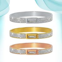 Bangle rostfritt stål armband full diamant baguette roterande spänne handarmband vackert utformad för kvinnor flickor fest gåvor