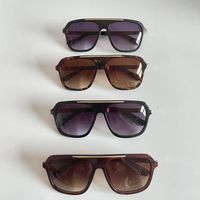 Occhiali da sole di lusso per uomo Protezione UV Designer Donne Moda Occhiali da sole di alta qualità Vintage Driving Eyewear