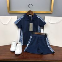 2021SS Boys Polo Shirts Set Marca Ropa de bebé Diseñadores Kids Knit Boy Sets Cortas de algodón di Y O Niños Traje Deporte Dwing Piece