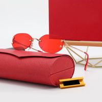 Gafas de sol de moda ovalada roja Mujeres de diseño de mujeres Gafas Sun Gasas clásicas de oro sin marco de lujo Sonnenbrille de gafas pequeñas calientes calientes