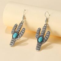 Chandelier de style rétro de style rétro turquoise en pierre de pierre en métal boucles d'oreilles pour femmes bijoux bohème de la plante de la mode