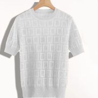 Camisa de dise￱ador de su￩ter de mujer ropa de manga corta de c￡rdigan su￩teres de tejido de tejido de primavera y verano productos de altura ropa de la solapa