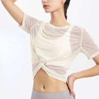 Наряд йоги гимнуб задняя одежда Фитнес-одежда Женская свободная дышащая для быстрого сушки футболка для спортивной блузки.