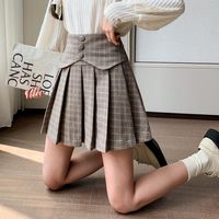 Jupes à carreaux de laine d'hiver Mini pour femmes Harajuku jupe féminin Boutons de la taille haute irrégulière Streetwear Short plissé