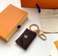 2022designer mektup cüzdan anahtarlık anahtarlık moda çanta kolye araba zinciri cazibesi kahverengi çiçek mini çanta biblo hediyeleri aksesuarları