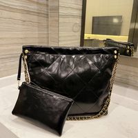 black patent designer handbag