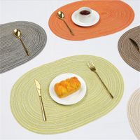 日本スタイルの織り熱断熱マットモダンピュアカラーオーバルコースター天然綿糸ディナーテーブルパッドノンスリップアンチスカルド食器マットテーブルデコレーション