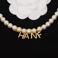 Collane di gioielli di marca francese di alta qualità Acciaio inossidabile di modo con collana del pendente del diamante per gli uomini donne all'ingrosso con scatola