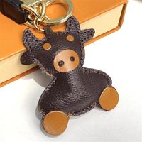 OX Cattle Cow Keychain Fashion Men Car Keyring Key Rings Holder Women Bull Ox Pendant Christmas New Year Gift with box343S