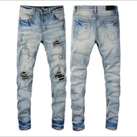2022 Pantalones de mezclilla para hombres de moda de alta calidad Pantalones de mezclilla rasgados Hip Hop Luxury Zipper Pantalers para hombres $ 799