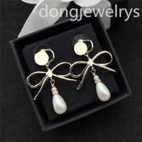 Dangle Pearl Charme Designer Ohrring Frauen Hoop Huggie echte Luxus -Ohrring Dongjewelrys Öffnung Ohrmanschette Mode Feine Schmuckarmbänder