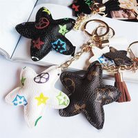 New Brand Keyrings PU Leather Pendant Bag Charms Cute Fashion Gift Keychain Ring Holder Flower Dog Giraffe Jewelry Car Key Chain A264i