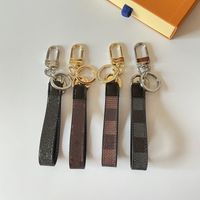 Luxury Cut Keychain for Men Key Cain -Ring Tither Designer Regal Box Women Car Keychains Cuero 4 colores