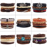 4pcs set Handmade Boho Gypsy Hippie Black Leather Rope Cord Wing Hand Leaves Compass Charm Stackable Wrap Bracelets for Man228O