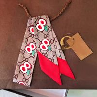 22SS Lotes de diseñador letras de diseño impreso Floral Silk Diadema para mujeres Manos de mango largo Bufandas de manejo París Libra