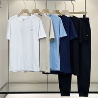 Luksusowe Projektanci Klasyczne Koszulki męskie Polos Z Krótkim Rękawem Biznes Dorywczo Haftowane Bawełna Najwyższej Jakości Mężczyźni T Krótkie Polo Czarne Odzież Spodnie Set Set Set