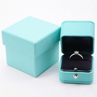 Роскошные романтические синие кожаные украшения подарочная коробка кольцо коробки для кольца Кольцо Кольцо Упаковка Организатор кольца для свадьбы предлагает 220805