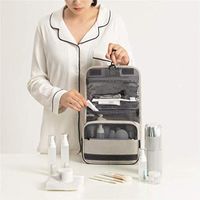Cosmetic Bags Cas Voyage portable suspension de toilette Pu Pliable Maquillage à fermeture éclair Organisateur Pouche fourchette fourre-tout