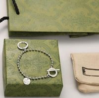 Hochwertiger Buchstaben G Luxusschmuckkette Anhänger Freeshipping Bijoux Designer CCI Original Verpackung ineinandergreifende Ballarmband ist ein trendiges Geschenk für Paare