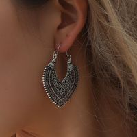 Orecchini a cuore intagliato bohémien Donne svuotano geometrica Orecchino di goccia europea in lega femmina in lega di orecchini gioielli antichi argento