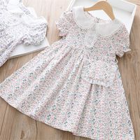 Vestido para niños para chicas vestidos florales diseño vestido de niña con bolso vestido de princesa de manga corta 220526