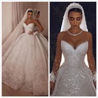 2020 Arabic Aso Ebi Lace Beaded Crystals Wedding Dresses Sheer Neck Long Sleeves Bridal Dresses Sexy Vintage Wedding Gowns ZJ522335v