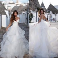 2020 Simple Boho Wedding Dresses A Line Lace Beads Tiered Skirts Sweep Train Sexy Backless Beach Wedding Gowns Customize Cheap Bri317x