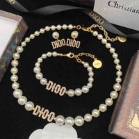 Fabrikauslass Hochwertiger neuer Buchstaben Schwein Nase Diamant Perlenkette Frauen Mode vielseitiges Armband Ohrringe