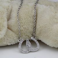 Bly- och nickelsmycken dubbel hästsko hänge halsband av hästsko smycken dekorerade med vit tjeckisk kristall245d