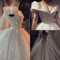Luxury Sparkle paljetter Bollklänning bröllopsklänning 2022 från axeln Dubai Arabiska brudklänningar Långt baklösa glänsande vestidos plus storlek C0601G04