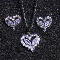 Collier de boucles d'oreilles mignon femelle coeur coeur bijoux de bijoux en cristal de charme en argent couleurs moulures d'oreille pour les femmes