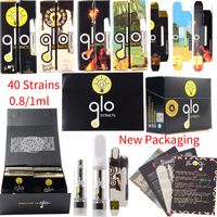 New Packaging 40 Strains Holographic GLO Extracts Vape Cartridges Atomizers Oil Carts Dab Wax Pen Ceramic Coil Glass Thick Tank 510 Thread Battery Vaporizer Empty