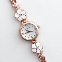 Relojes de pulsera Moda de lujo Correa de metal de alta calidad Classic Crystal Butterfly Flowers Watch Showly Student / Women Ladies Pulsera O120