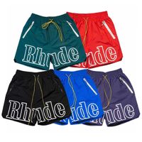 2022 العلامة التجارية الجديدة للأزياء Rhude Men and Women's Shorts Summer Street Street Printing 3M Hip Hop Hop Disual Pants Beach Strendy