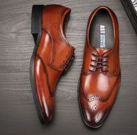 Los zapatos de vestir de cuero de los hombres de la calidad de lujo calzan agujeros respirables de cuero de vaca encerado Brock tallada moda europea propuesta Noble Eu38-44