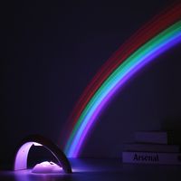 USB y 3AA Dos modelos de fuente de alimentación Modelos de proyector colorido Luces LED LED Lámpara de atmósfera de la vieira de la luz de la noche de la estrella del arco iris para la decoración