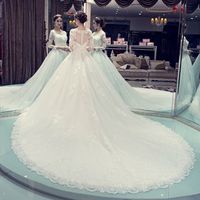2019 Księżniczka Modest Suknie Ślubne Wykonane w Chinach Sheer Neck Lace Aplikacje Złudzenie Długie Rękawy Przejdź przez Back Bridal Gown Kapella pociąg