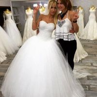 2019 Princess Puffy Tulle Ball Gown Wedding Dresses Sweetheart Sleeveless Sparkly Sequins Beaded Top Fit and Flare Bridal Gowns with Train