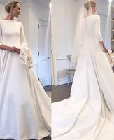 Skromne Satynowe Suknie ślubne 2020 Meghan Markle Style Bateau Neck Długie Rękawy Suknie Ślubne Ogród z zadaszonymi przyciskami Powrót