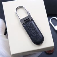 porte-clés unisexe porte-clés en cuir avec 316L en acier inoxydable de meilleur cadeau pour hommes avec la boîte