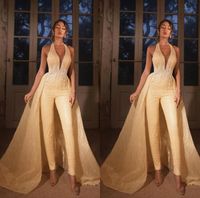 2020 Jumpsuit en or avec jupe détachable Halter dentelle appliquée robes de soirée sans manches sans manches de balayage Train Plus Taille Taille Robes de bal sexy