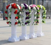 新しい白いプラスチックローマのコラムの結婚式の中心部ピースの柱の花は結婚式のモールを開いた小道具のために引用されています
