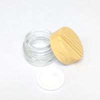 Mini Glass Jar Cream Flaskor Runda kosmetiska burkar Hand Face Cream Wax Oil Bottle med plast trä kornlock