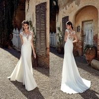 2019 nuevo diseñador de playa sirena vestidos de novia sexy de encaje apliques perlas Sheer cuello piso longitud bohemio baratos vestidos de novia