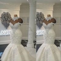 Neue sexy Luxus Dubai Arabische Meerjungfrau Brautkleider High Hals Illusion Spitze Applikationen Kristall Beaing Hohl Back Tüll Formale Brautkleider