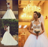 Wholesale 2021 Sweetheart Saudi Arabic Backless Winter Wedding Dresses Zipper Back Appliques Beaded Bodice Sheer Ball Gown Organza Bridal Gowns