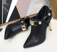 Wholesale 2019 hot selling metal decorations high heel boots sexy pointed toe ankle boots woman black leather boots golden heel botas